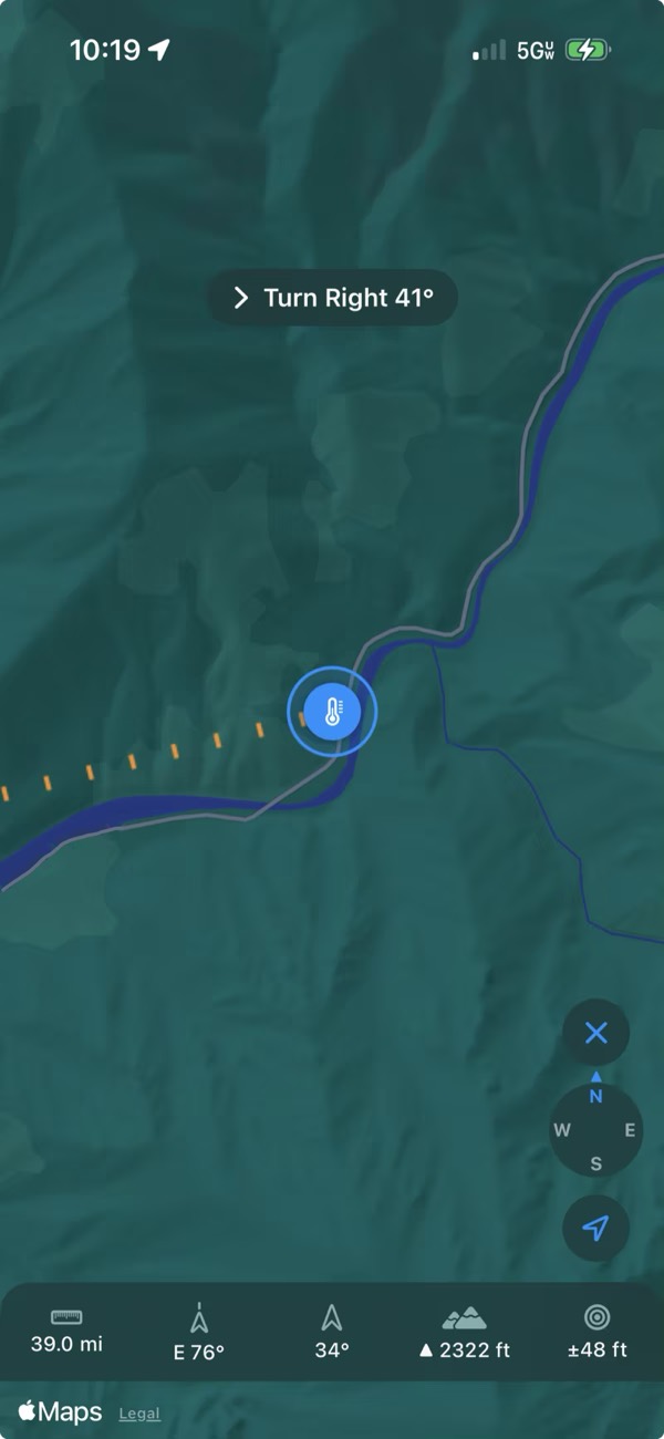 Adventure mode: a terrain map with a dashed line from the hiker to a hot spring beside a river, a Turn Right 41 degrees prompt, a compass, and a readout bar showing 39.0 miles, bearing east 76 degrees, heading 34 degrees, elevation 2,322 feet, and GPS accuracy of plus or minus 48 feet.